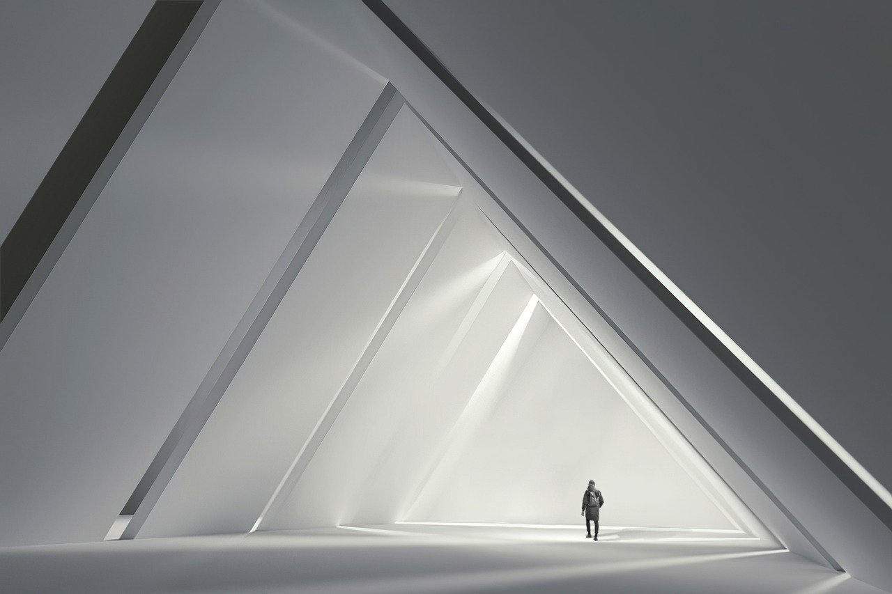 Person walking through light triangles